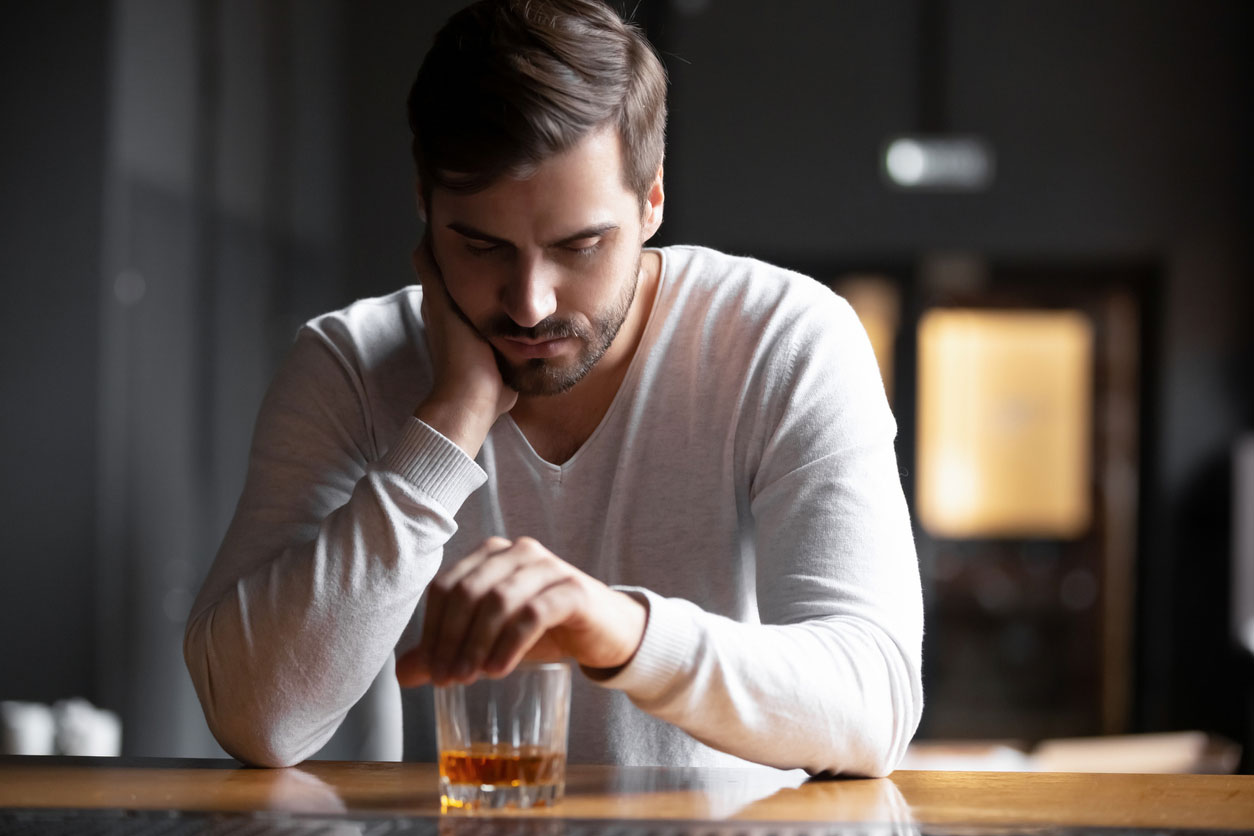 Man Drinking Alone and Feeling Lonely