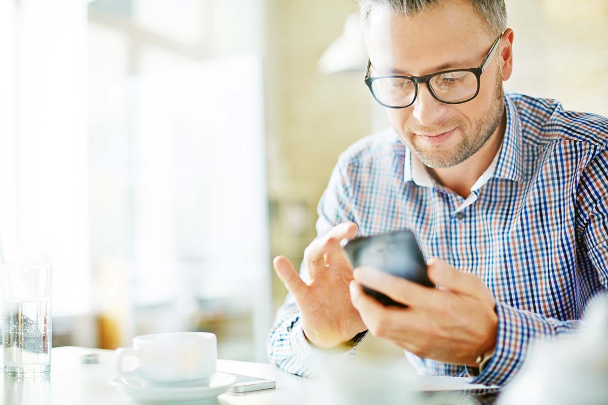 Man Checking Phone After A Dating App Disaster