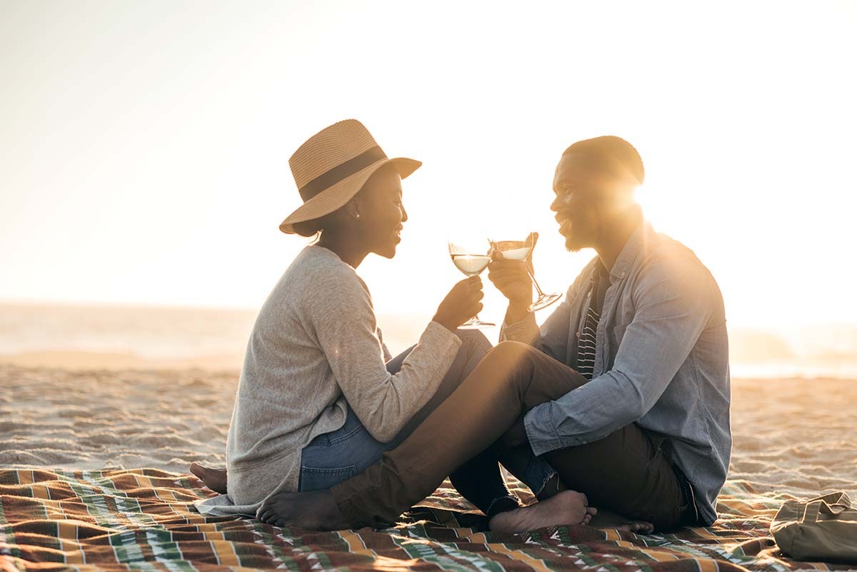 Couple Toasting on the Beach - Five Apology Styles