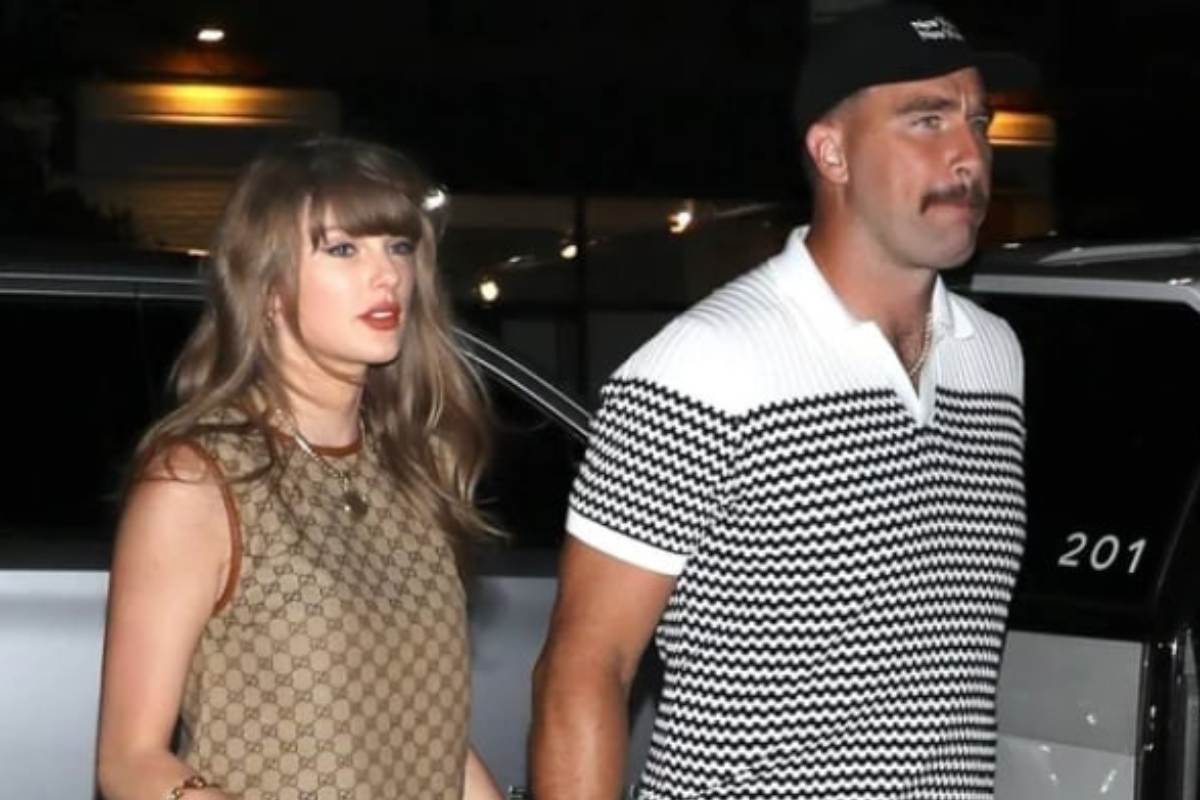 Taylor Swift and Travis Kelce captured together by photographers.