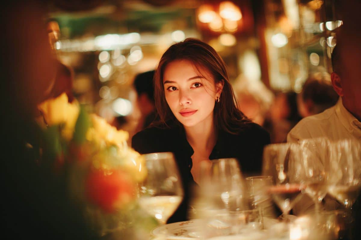 Attractive confident woman in restaurant